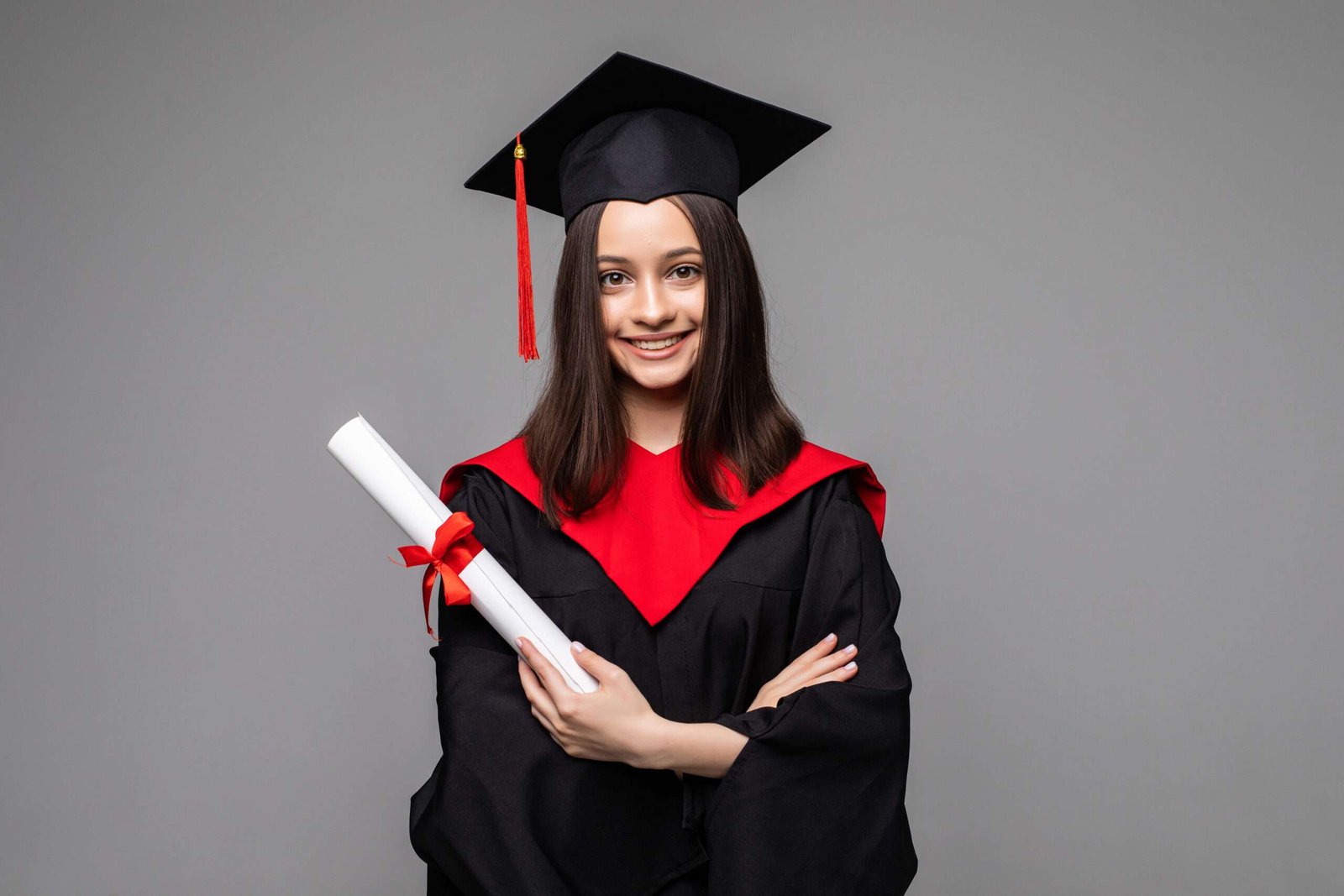 student standing with scholarship