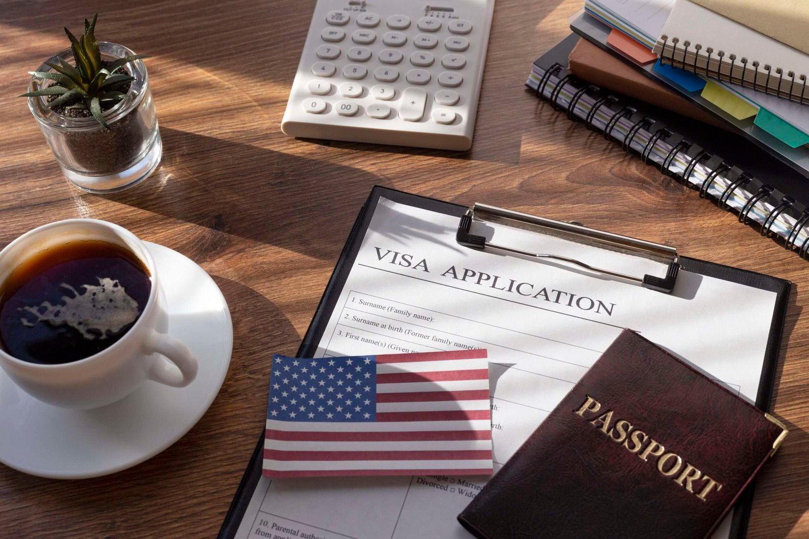H1B visa application-composition-with-american-flag on a desk